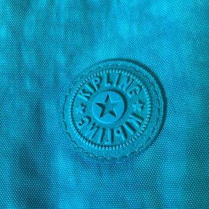 Turquoise Kipling bag with monkey named Marilyn :)